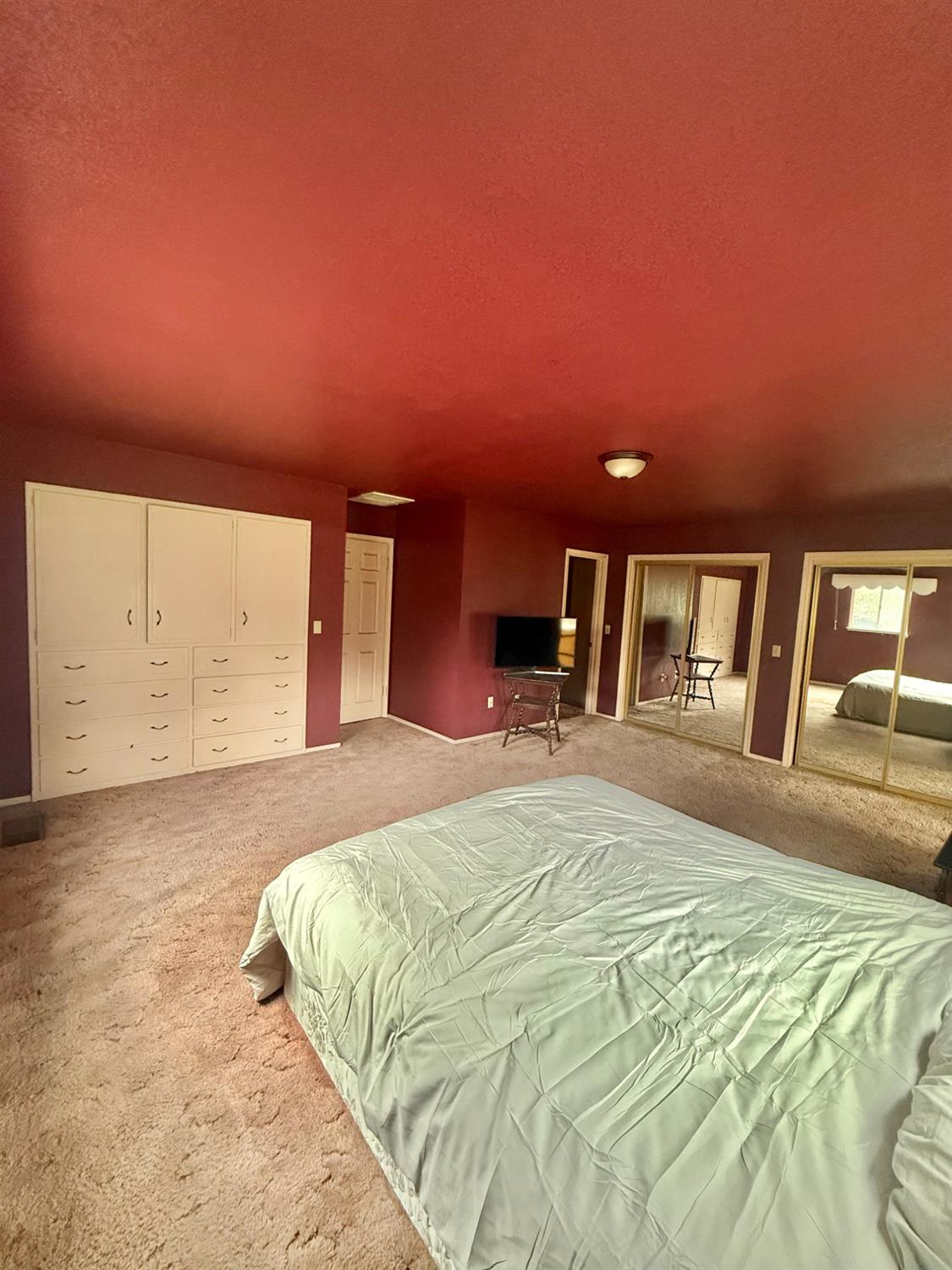 2524 B&B Boulevard Merced, CA 95348 - Photo 18 of 26 a large bed sitting in a bedroom next to a large window