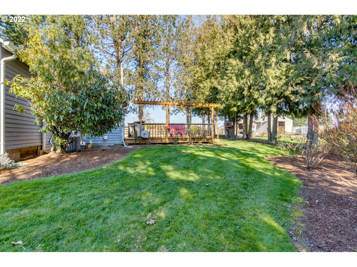 18876 Butteville Road Northeast Aurora, OR 97002 - Photo 13 of 32 a view of a house with a big yard