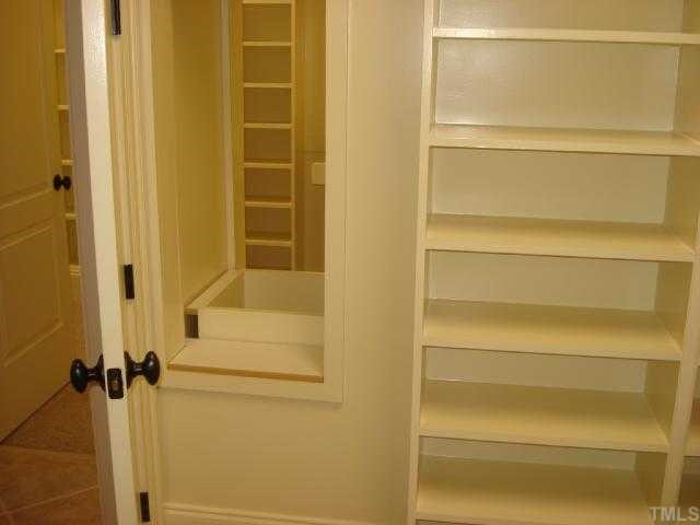 3308 Cotten Road, Unit LOT85 Raleigh, NC 27603 - Photo 10 of 12 Best his & hers closets ever! Retrieve your dirty laundry from this bin in between the closets or from the laundry room on the other side of the wall! Other