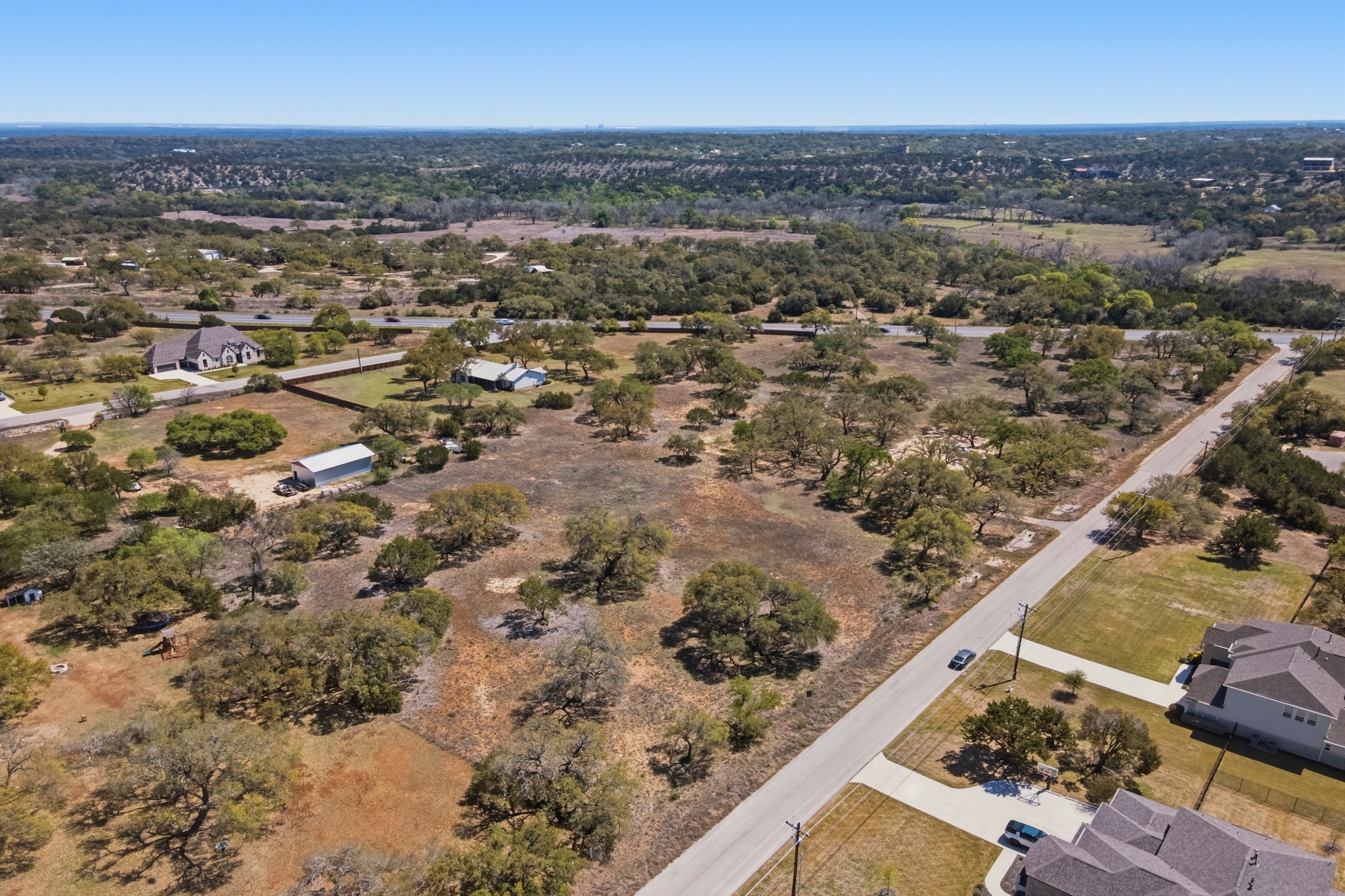 268 Kinnikinik Loop Austin, TX 78737 - Photo 16 of 32 an aerial view of multiple house