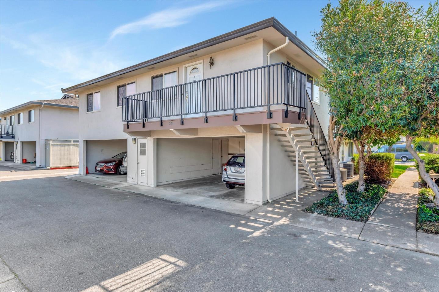 231 Watson Drive, Unit 4 Campbell, CA 95008 - Photo 15 of 16 a view of a house with a street
