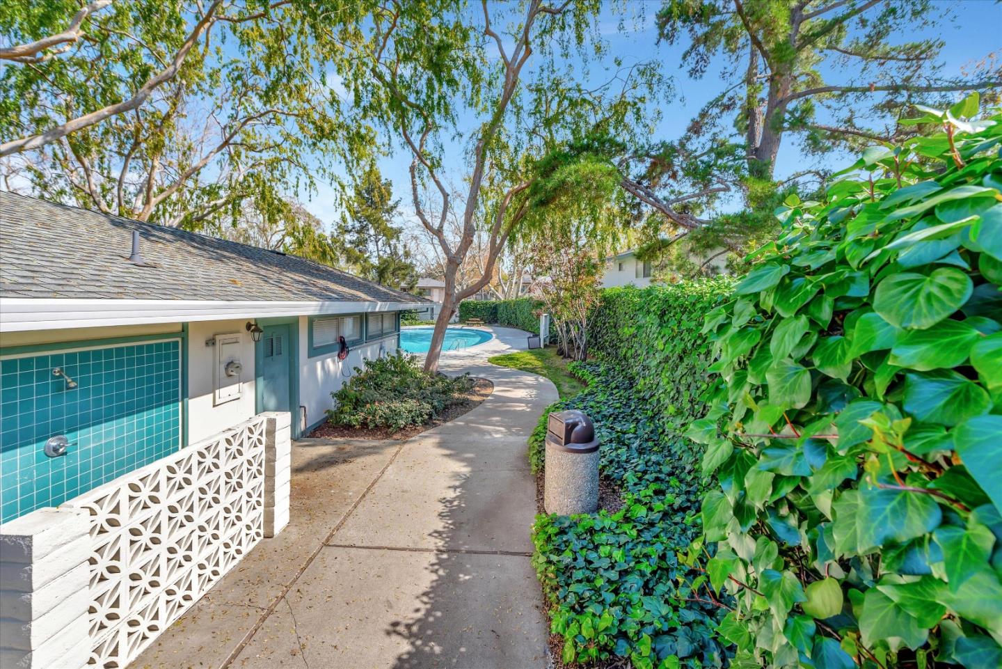 231 Watson Drive, Unit 4 Campbell, CA 95008 - Photo 16 of 16 a front view of a house with garden