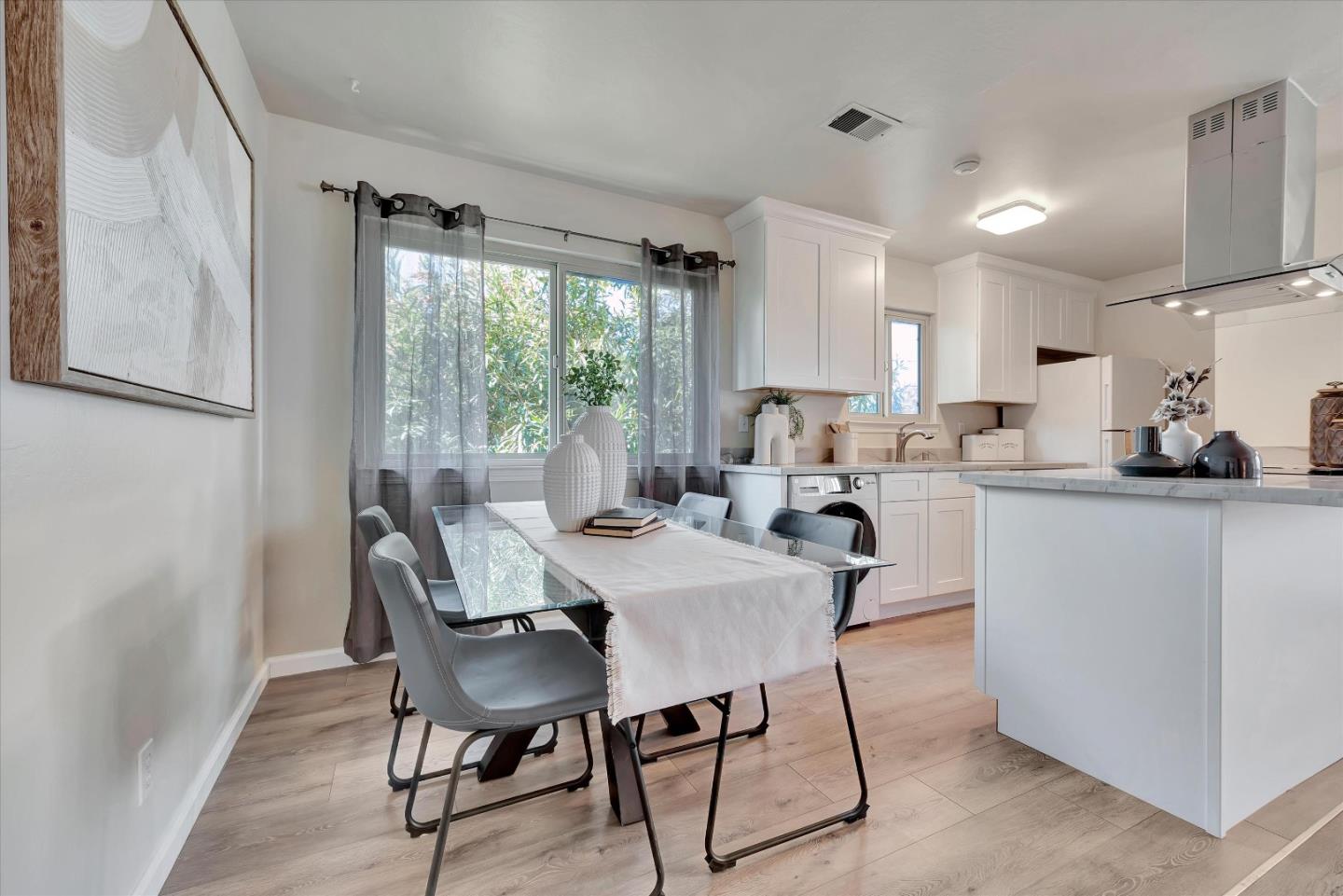 231 Watson Drive, Unit 4 Campbell, CA 95008 - Photo 9 of 16 a view of a dining room with furniture window and outside view