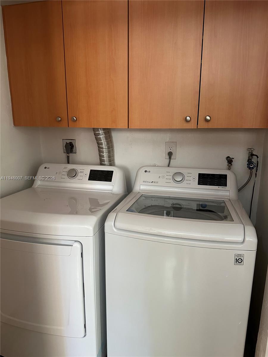 326 East 34th Street Hialeah, FL 33013 - Photo 13 of 26 a utility room with dryer and washer
