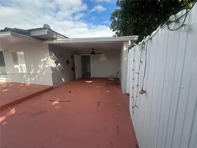 a view of a hallway with entryway