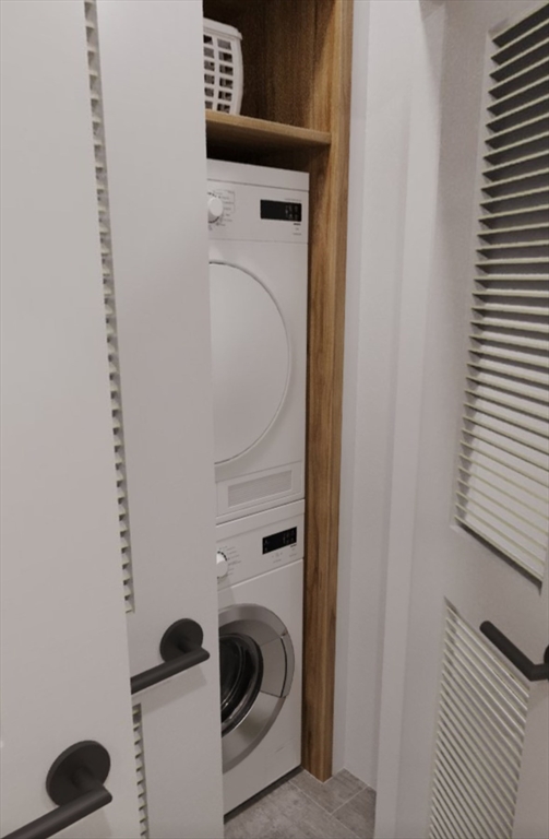 272 Talbot Avenue, Unit 203 Boston, MA 02124 - Photo 11 of 12 a utility room with dryer and washer