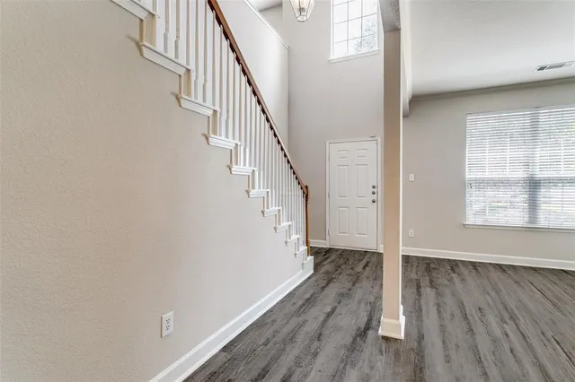 a view of entryway with wooden floor