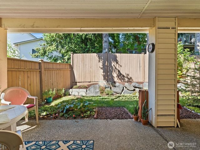 a garden view with a seating space