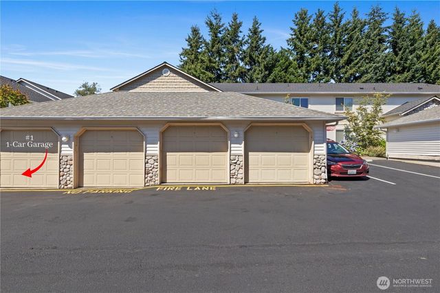 a view of a house with a street