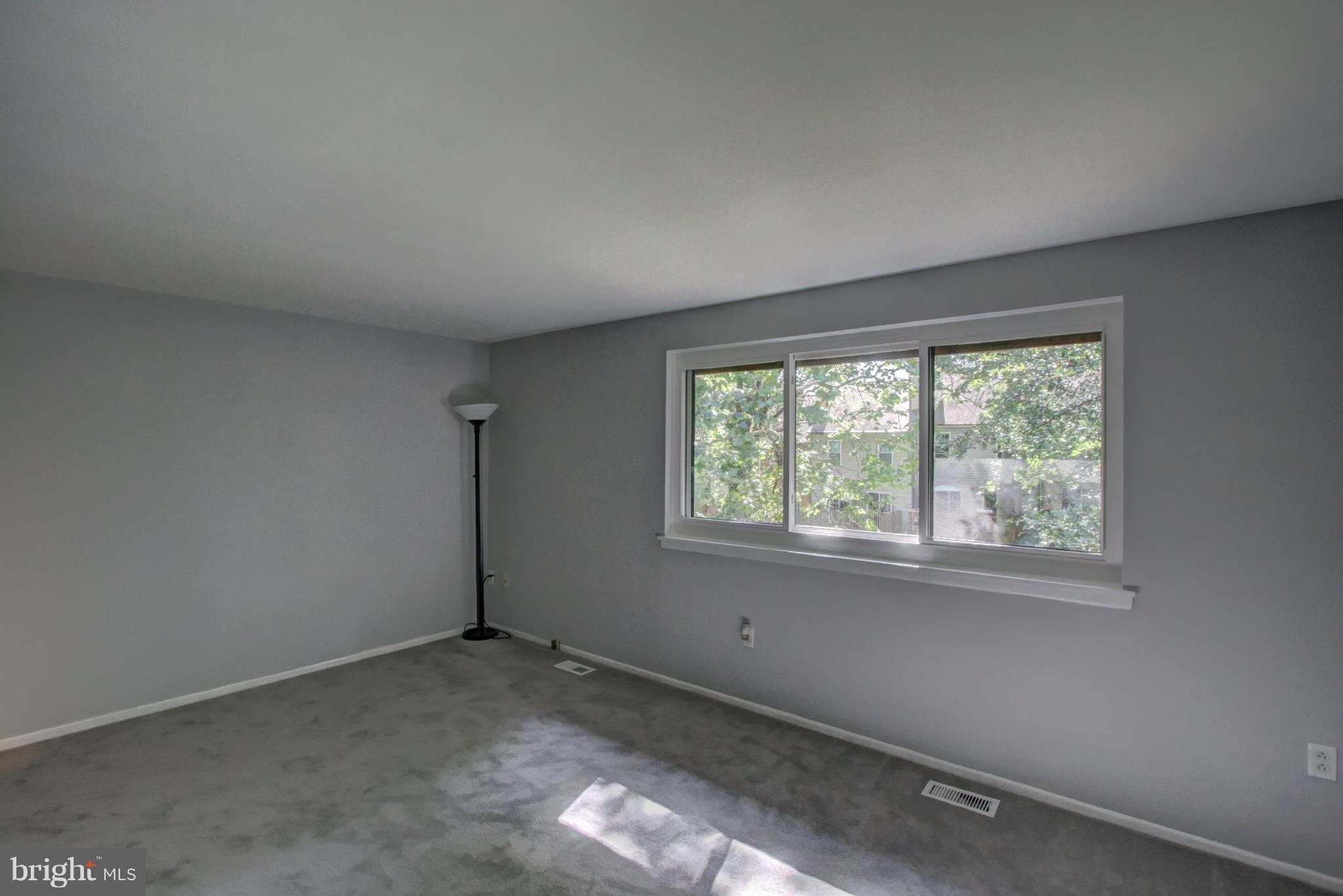 7068 Winter Rose Path Columbia, MD 21045 - Photo 14 of 30 an empty room with a window