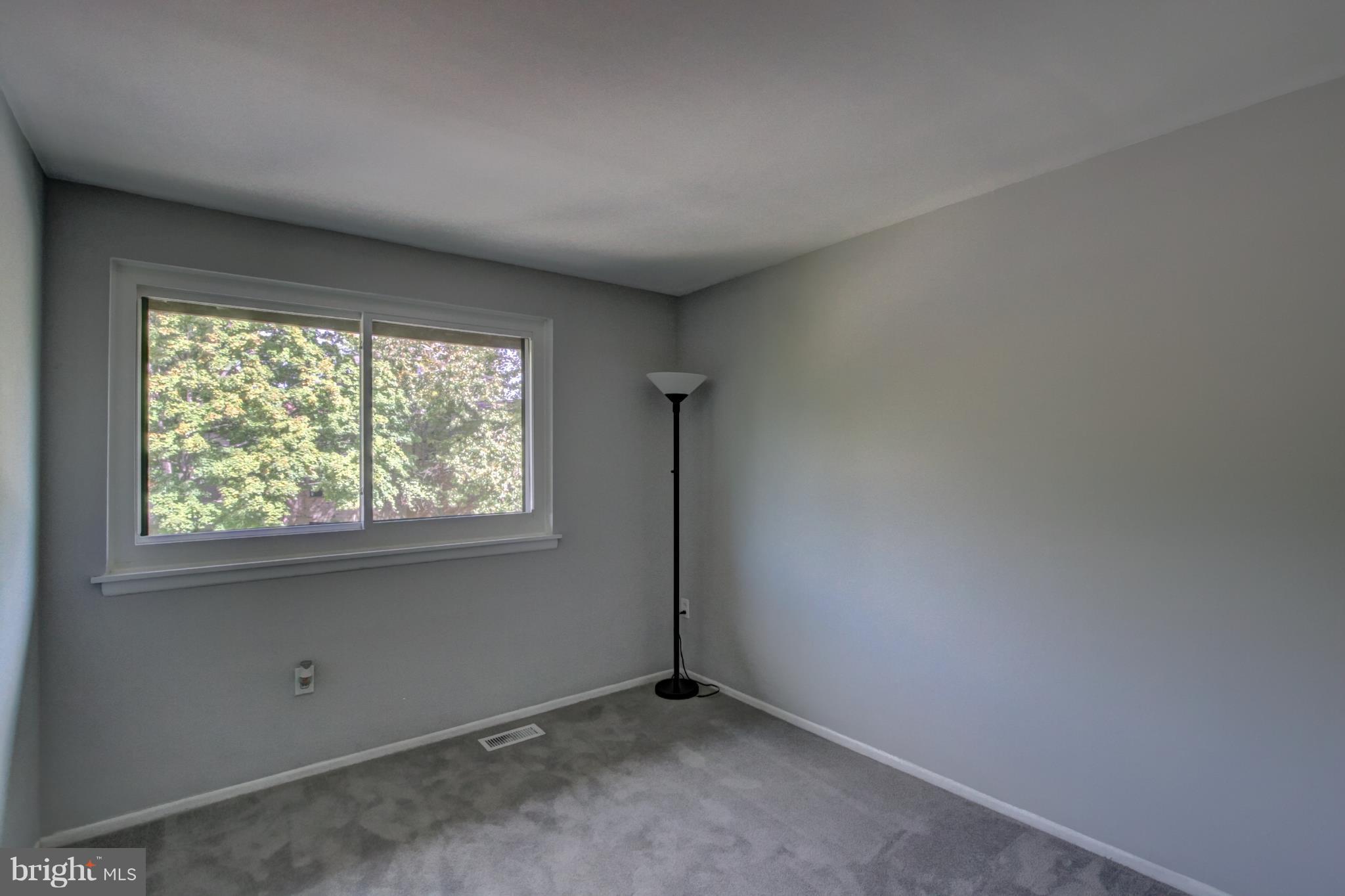 7068 Winter Rose Path Columbia, MD 21045 - Photo 18 of 30 an empty room with a window