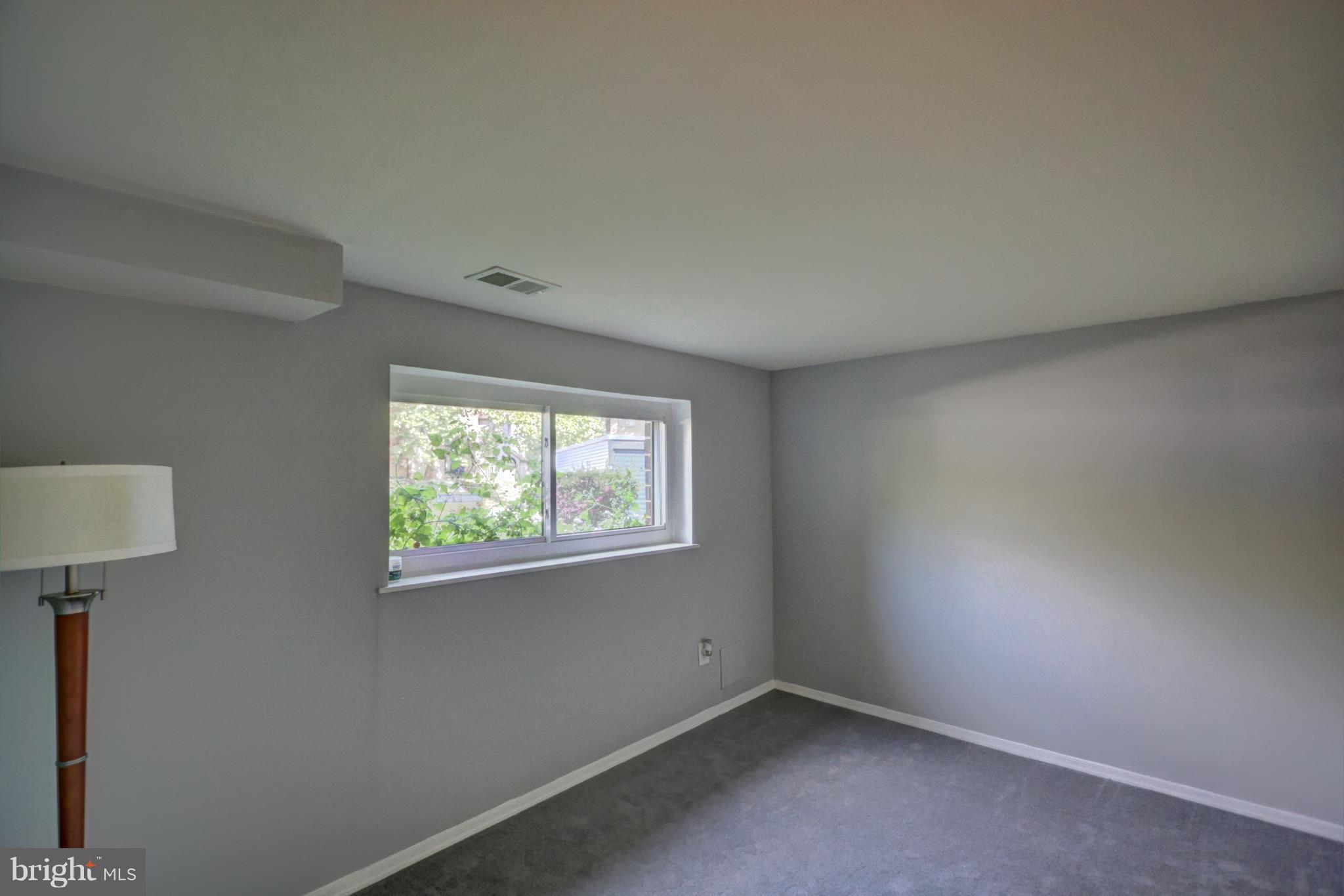 7068 Winter Rose Path Columbia, MD 21045 - Photo 20 of 30 an empty room with windows