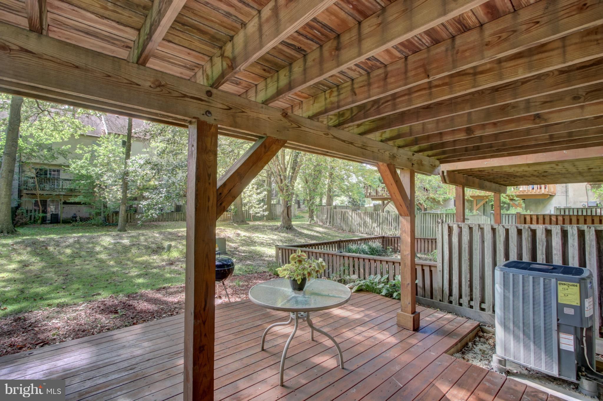 7068 Winter Rose Path Columbia, MD 21045 - Photo 24 of 30 a view of a porch with wooden floor