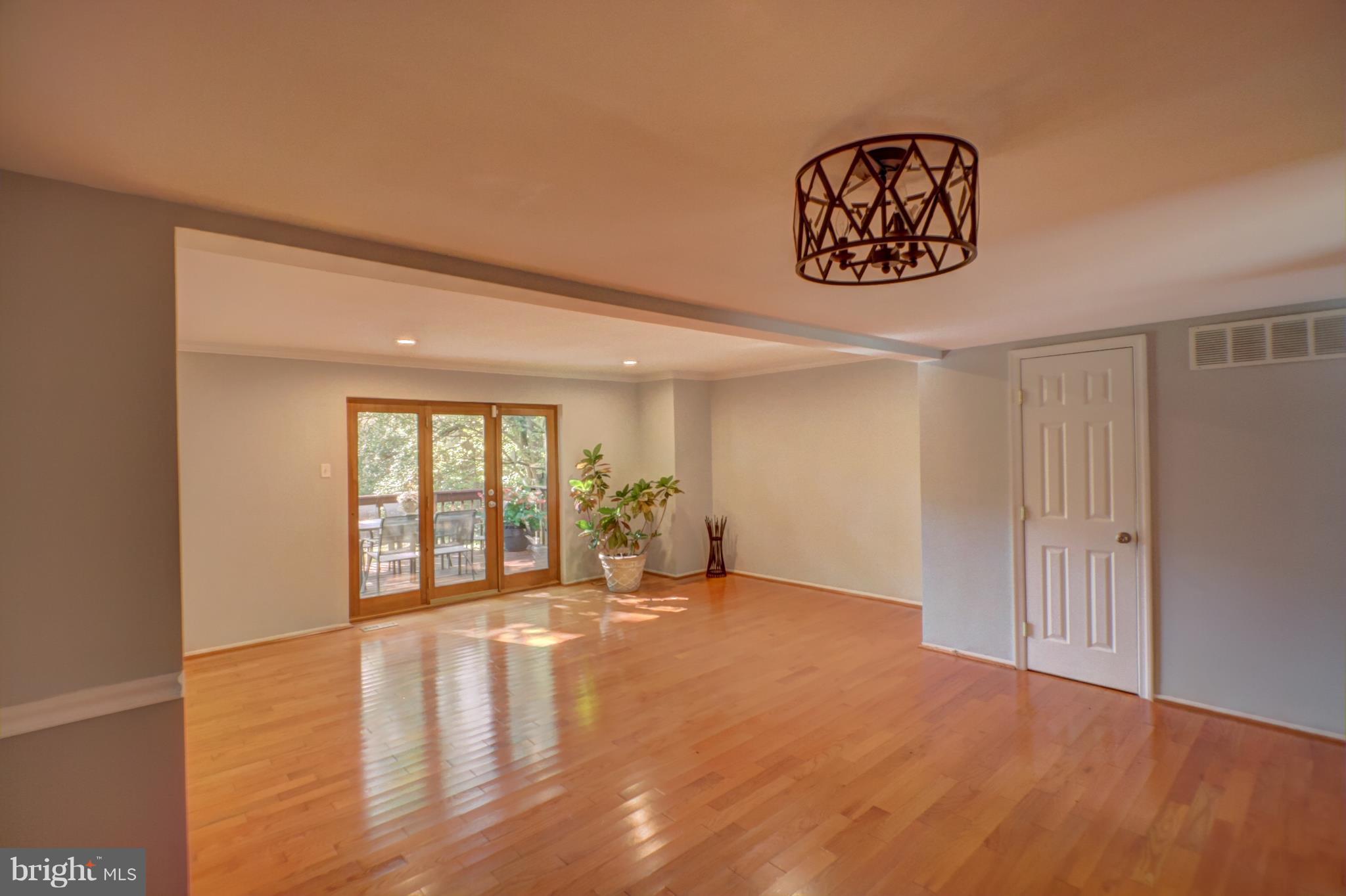 7068 Winter Rose Path Columbia, MD 21045 - Photo 9 of 30 a view of an empty room with a window