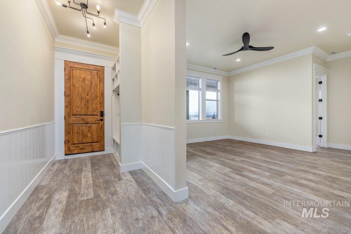 5990 West View Drive Meridian, ID 83642 - Photo 26 of 50 Entryway featuring light wood-type flooring, a ceiling fan, and ornamental molding