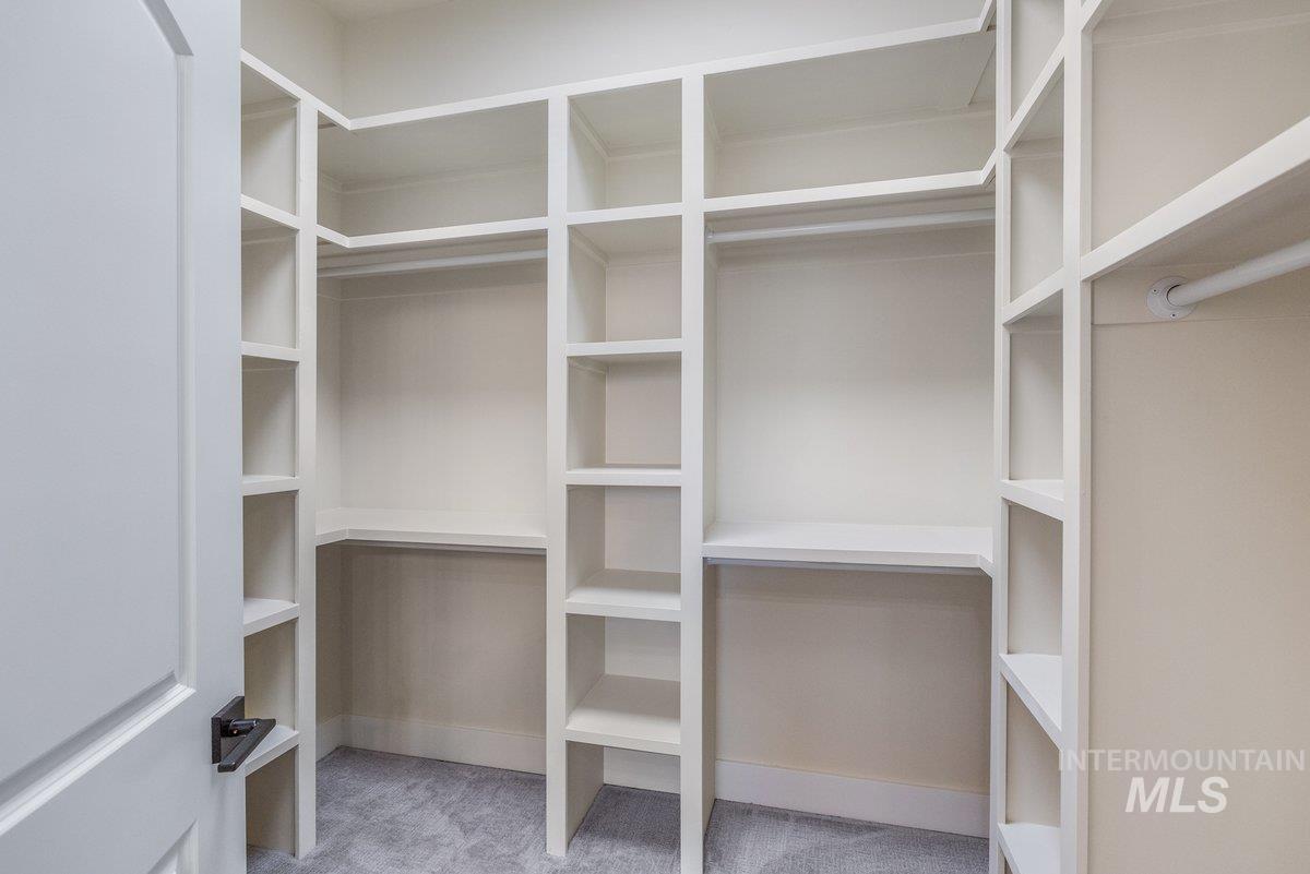 5990 West View Drive Meridian, ID 83642 - Photo 32 of 50 Walk in closet featuring light colored carpet