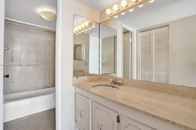 a view of wooden floor and brick walls