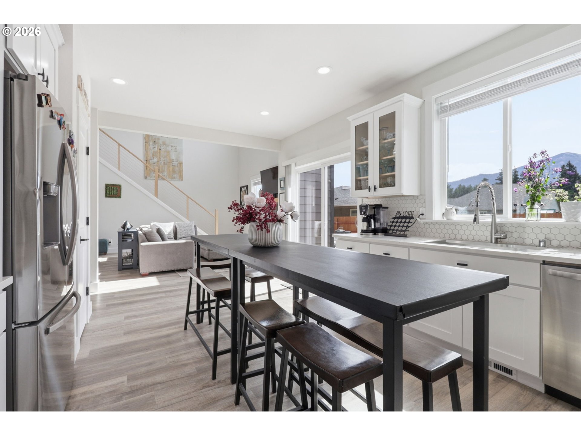 1226 Northwest Iman Loop Road Stevenson, WA 98648 - Photo 11 of 39 a view of kitchen and dining area with furniture