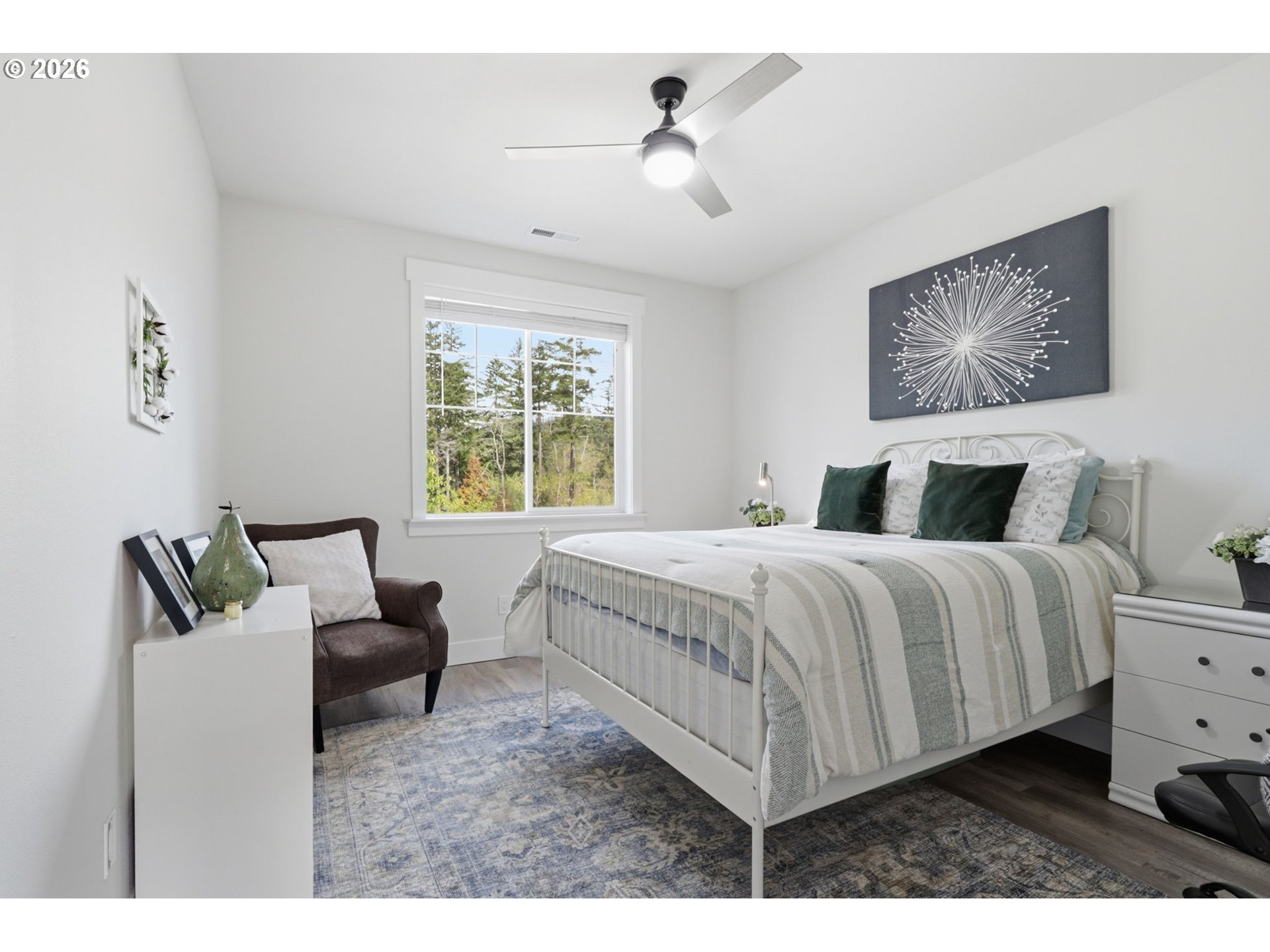 1226 Northwest Iman Loop Road Stevenson, WA 98648 - Photo 21 of 39 a bedroom with a bed and a couch