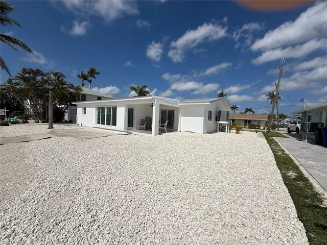 a view of a house with a patio
