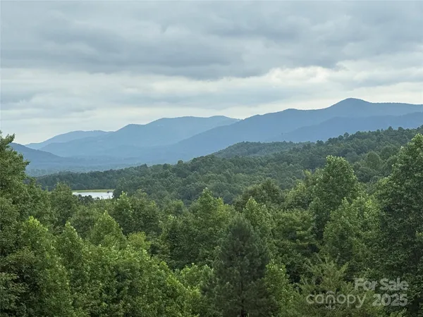 a view of mountains and valleys