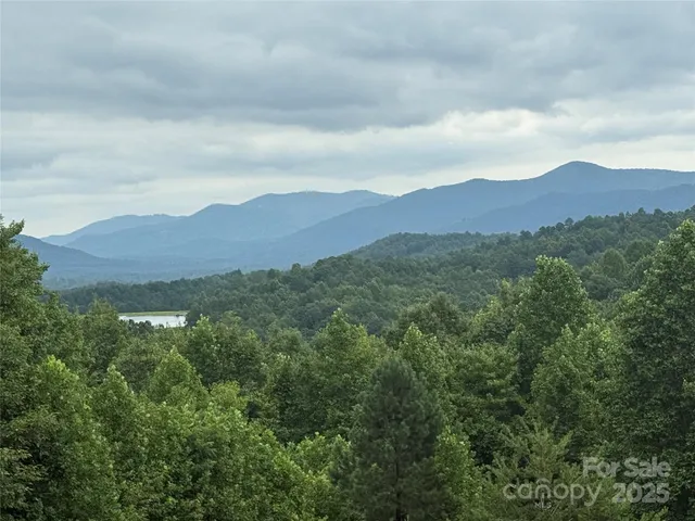 a view of mountains and valleys