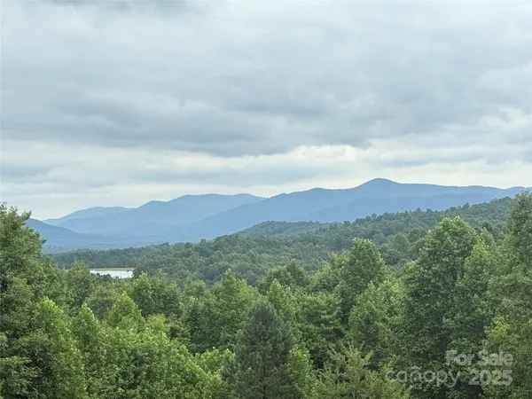 a view of mountains and valleys
