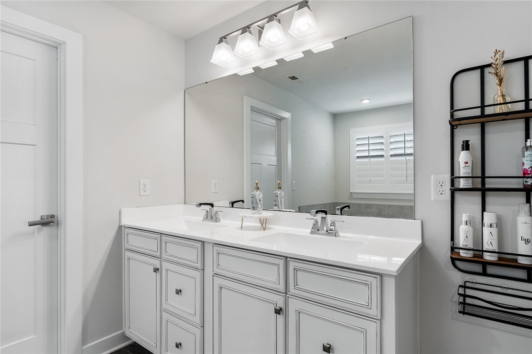 216 Bronson Ridge Anderson, SC 29621 - Photo 28 of 45 Double vanity with ample counter space and a large mirror completes this well-appointed bathroom.