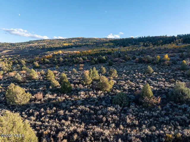 a view of an ocean and city