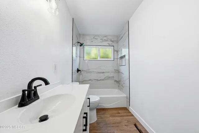 a bathroom with a sink and a bathtub