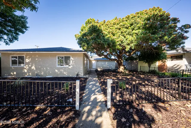 a view of house with outdoor space