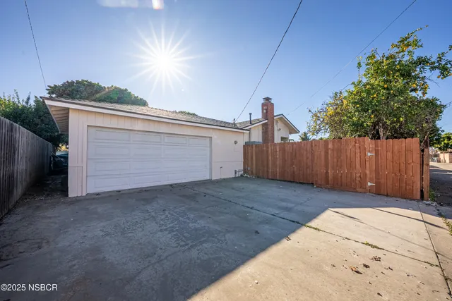 a view of backyard and tree
