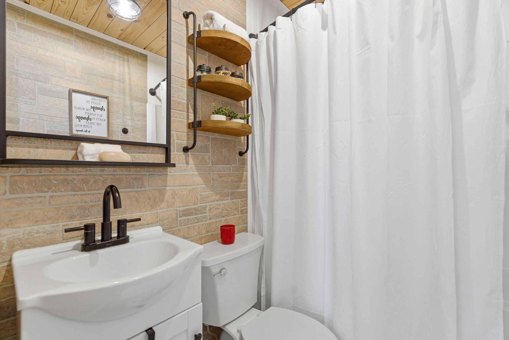3106 Cimarron Trail Murfreesboro, TN 37129 - Photo 17 of 33 a bathroom with a sink a toilet and shower curtain