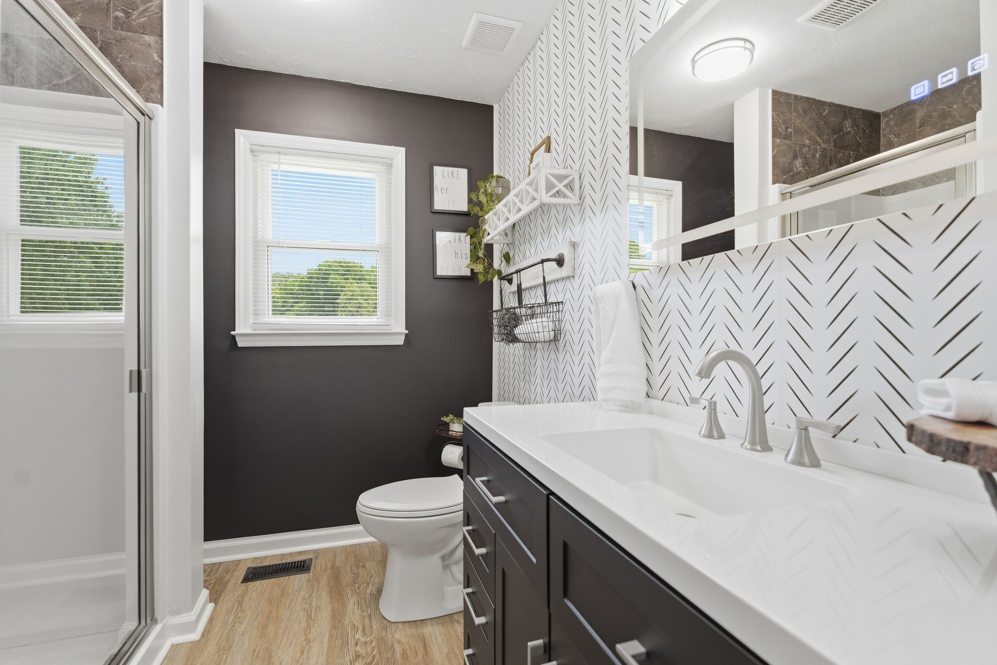 3106 Cimarron Trail Murfreesboro, TN 37129 - Photo 22 of 33 a bathroom with a sink a toilet and a mirror