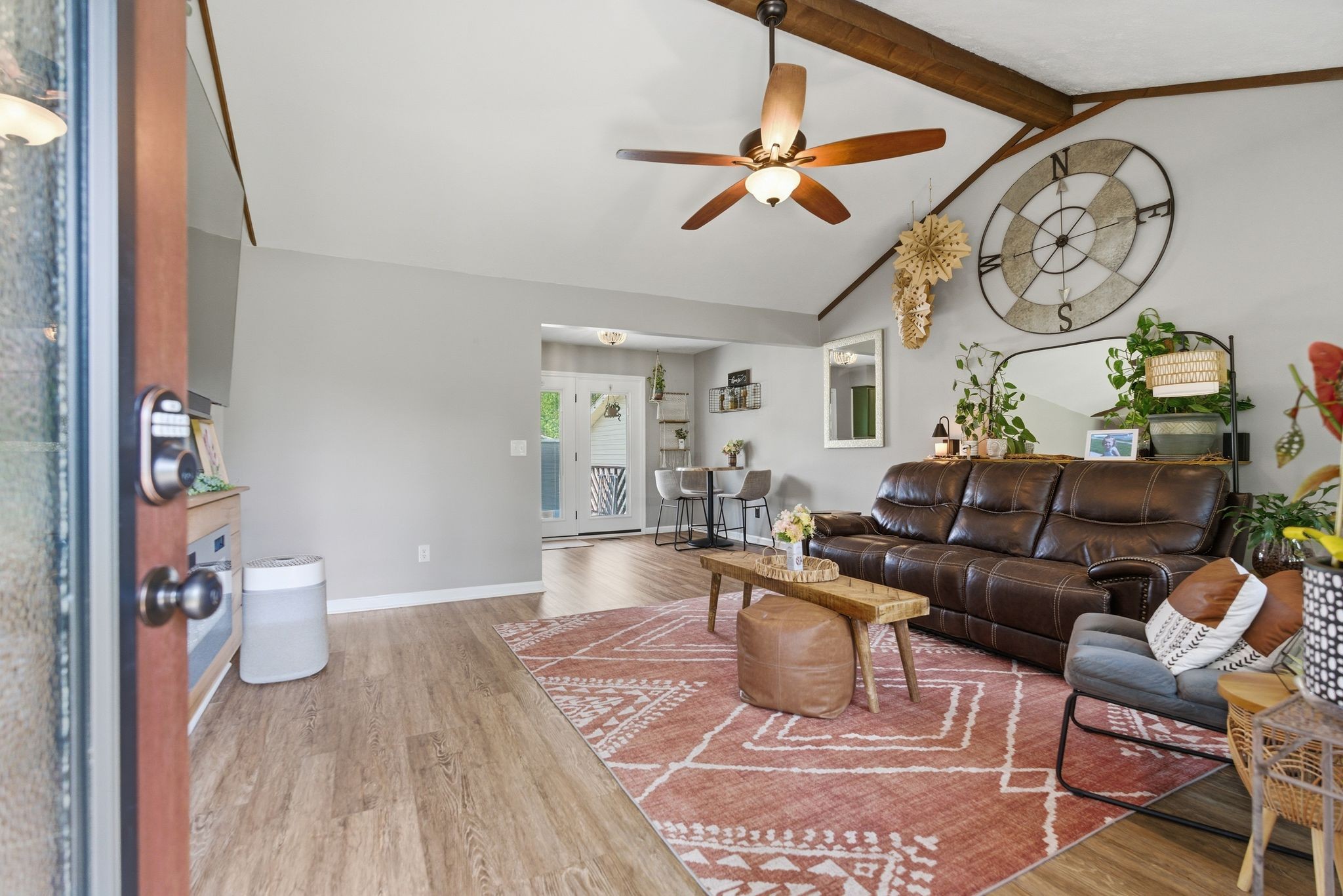 3106 Cimarron Trail Murfreesboro, TN 37129 - Photo 4 of 33 a living room with furniture a clock on wall and a window