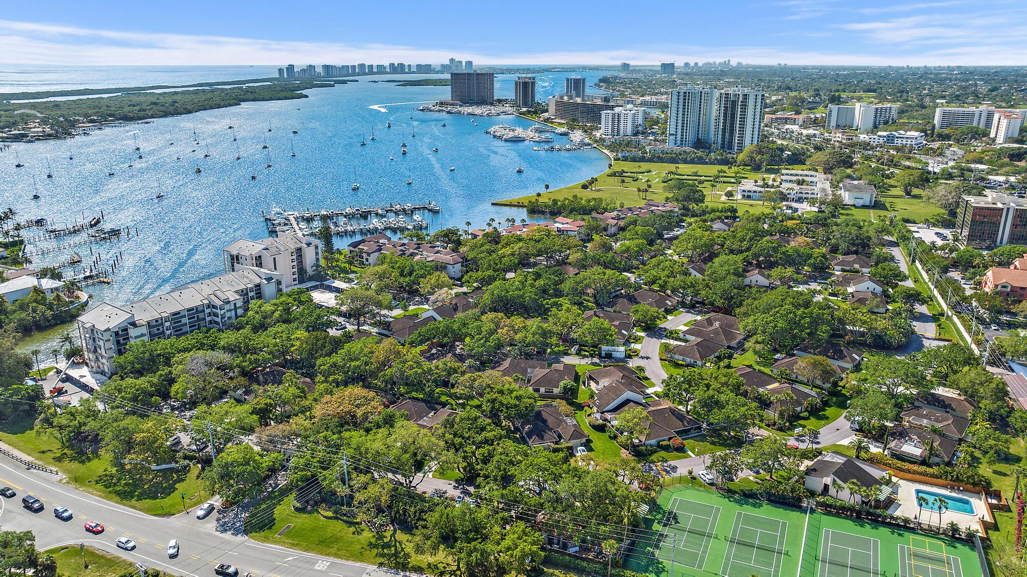 1660 12 Oaks Way, Unit 101 & 50FT SLIP North Palm Beach, FL 33408 - Photo 1 of 39 a view of a city