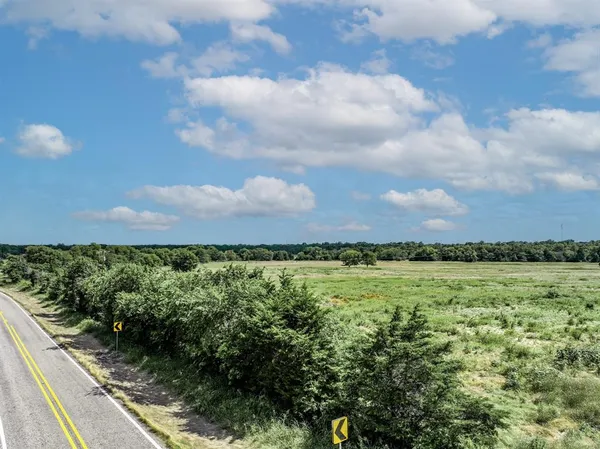 a view of a yard with an outdoor space