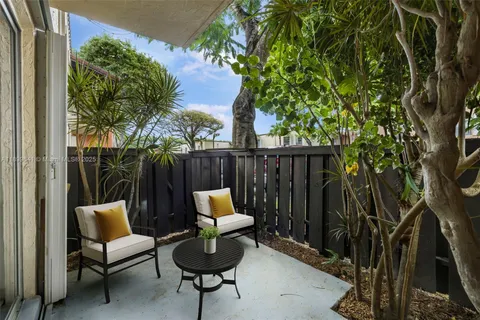 a view of a chairs on the deck