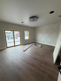a view of an empty room with a window