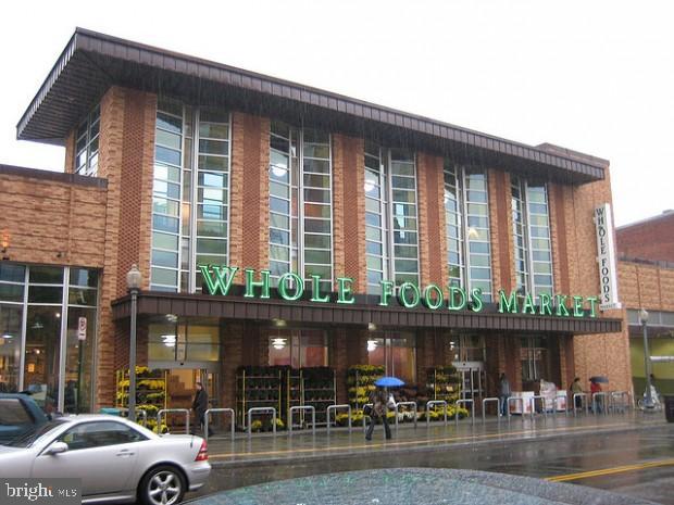 2141 I Street Northwest, Unit 615 Washington, DC 20037 - Photo 13 of 16 a front view of a building with patio