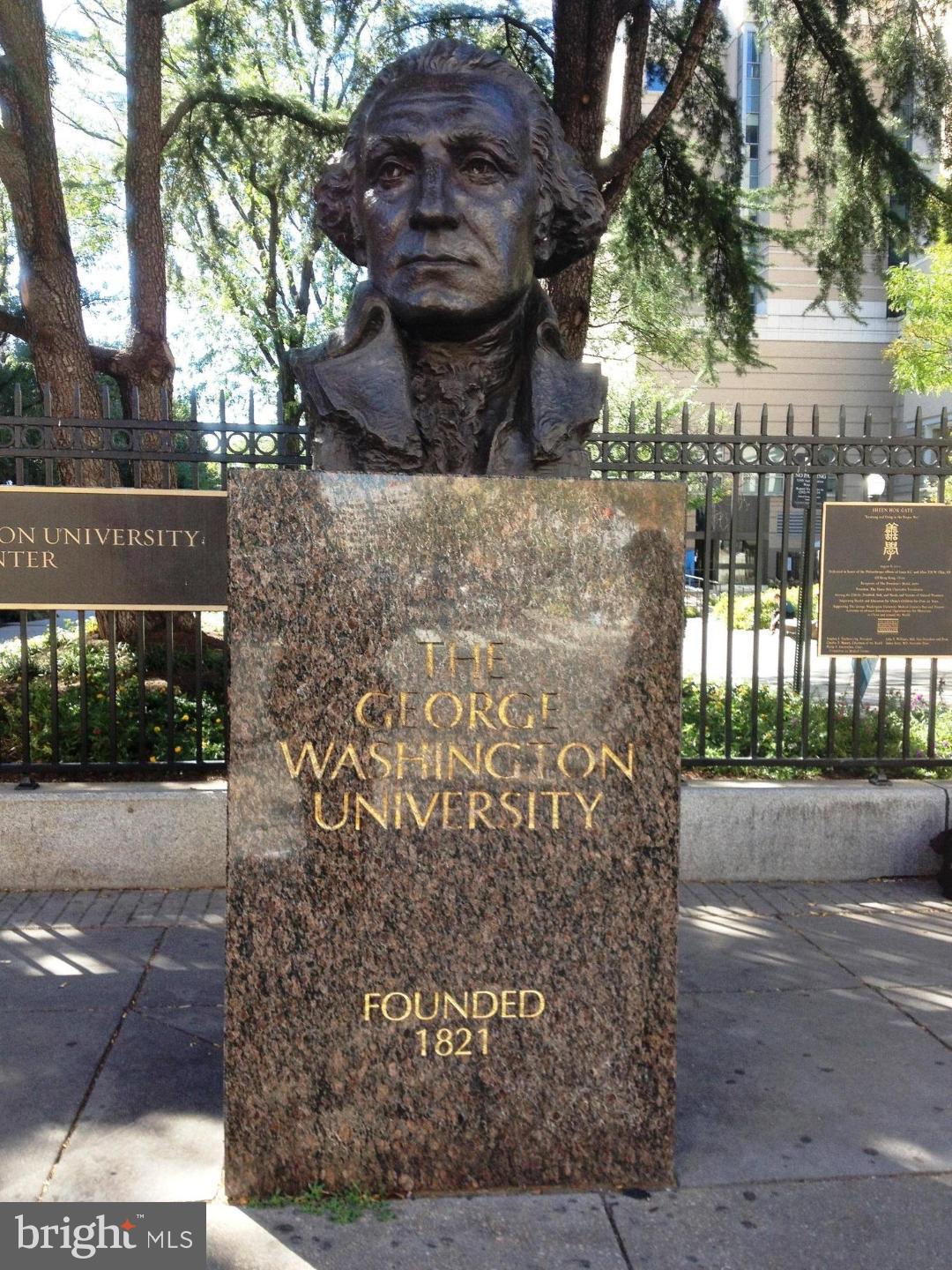 2141 I Street Northwest, Unit 615 Washington, DC 20037 - Photo 14 of 16 a view of a pathway with a wrought fence
