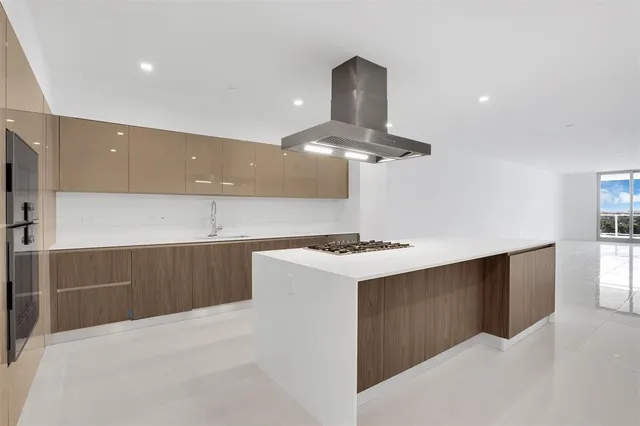 a bathroom with a double vanity sink tub and mirror