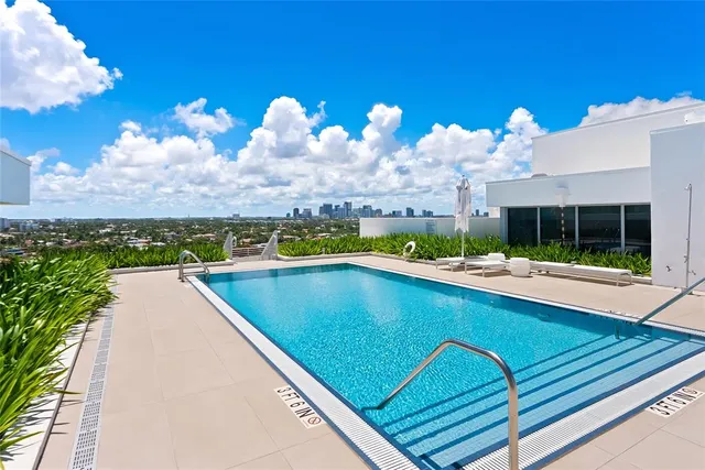 a view of a house with a swimming pool
