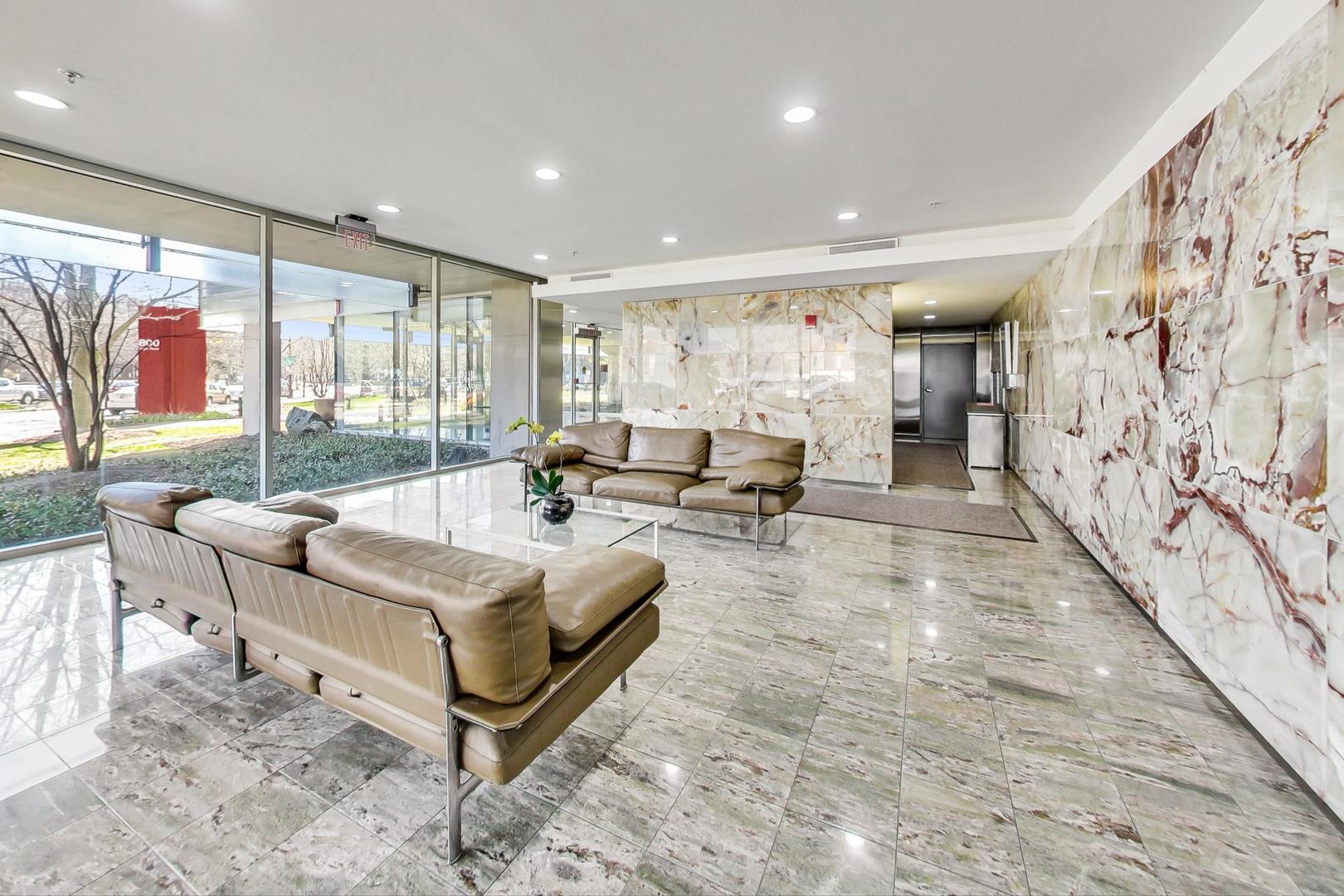 800 Elgin Road, Unit PH02 Evanston, IL 60201 - Photo 35 of 43 a living room with furniture