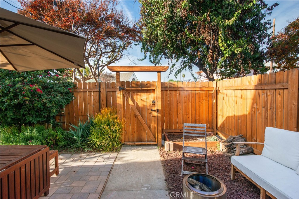 342 North Atlantic Boulevard Alhambra, CA 91801 - Photo 20 of 24 a backyard of a house with outdoor seating