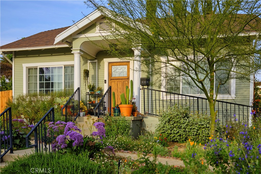 342 North Atlantic Boulevard Alhambra, CA 91801 - Photo 2 of 24 a view of a house with a flower garden
