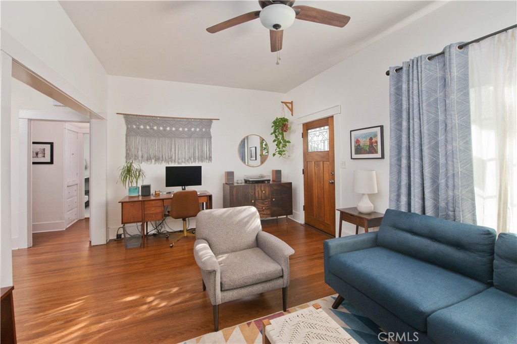 342 North Atlantic Boulevard Alhambra, CA 91801 - Photo 8 of 24 a living room with furniture or couch and a wooden floor