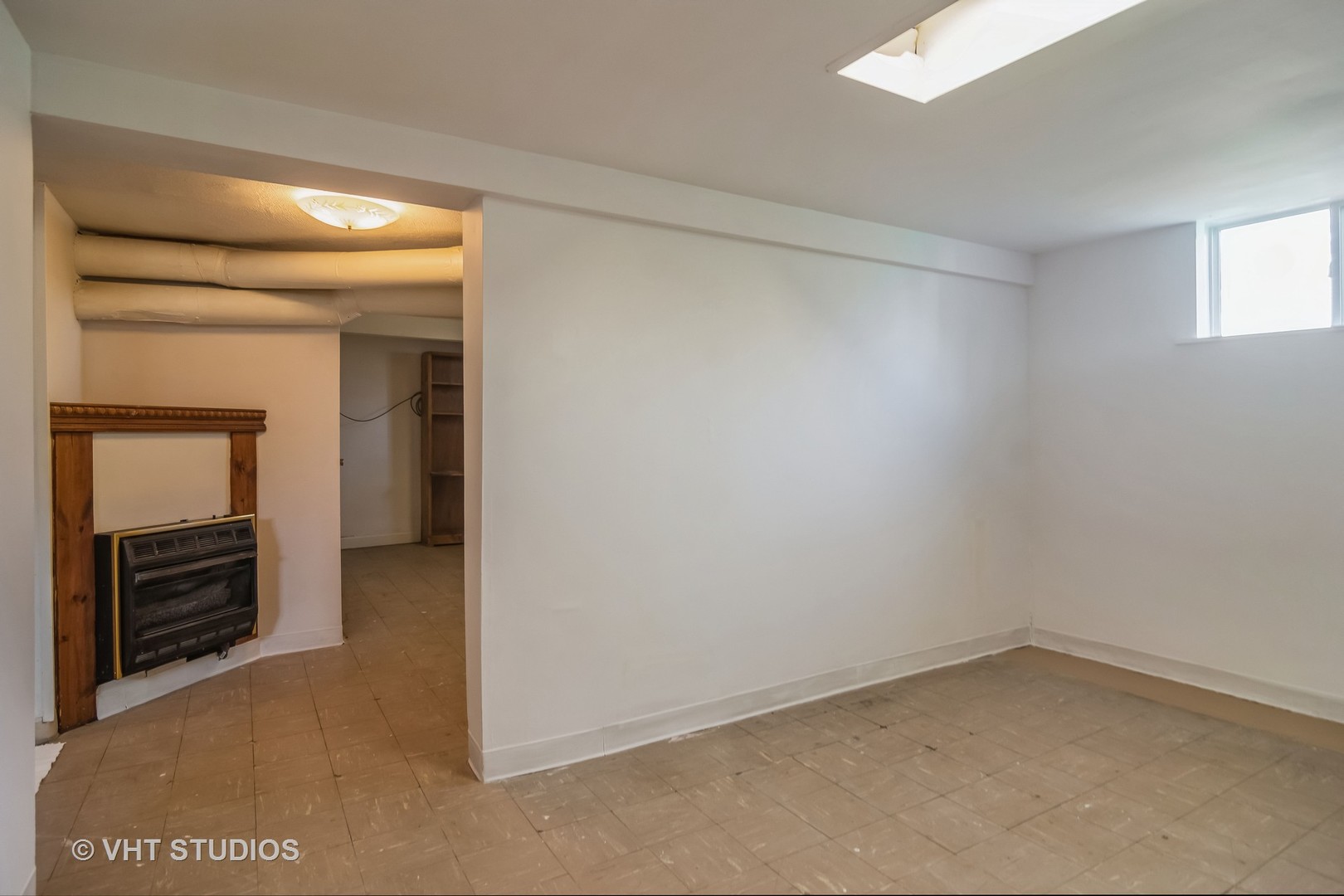 114 North Rohlwing Road Palatine, IL 60074 - Photo 11 of 16 a view of empty room with a fireplace