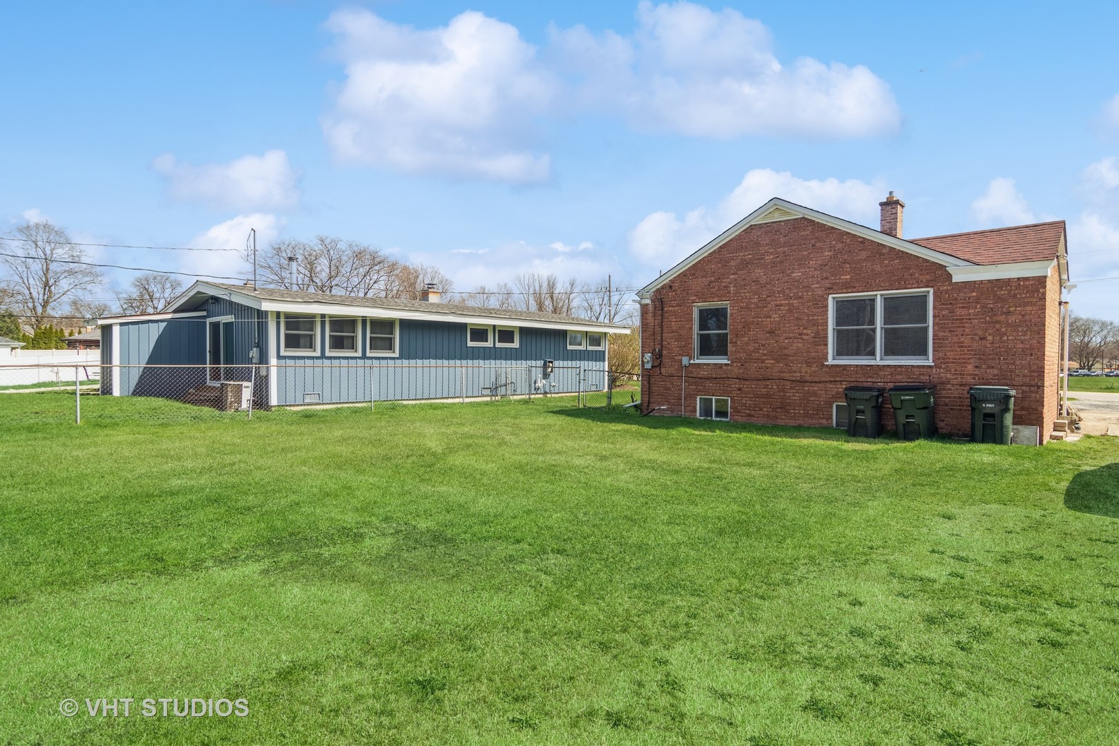 114 North Rohlwing Road Palatine, IL 60074 - Photo 15 of 16 a view of a house with a yard and sitting area