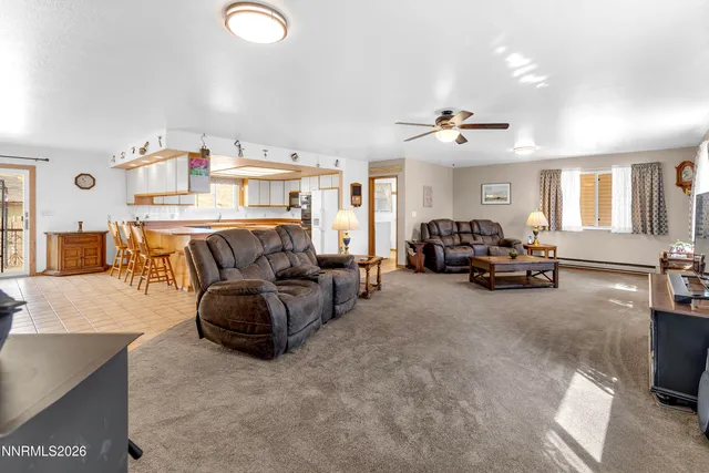 a bathroom with a tub a sink and a mirror